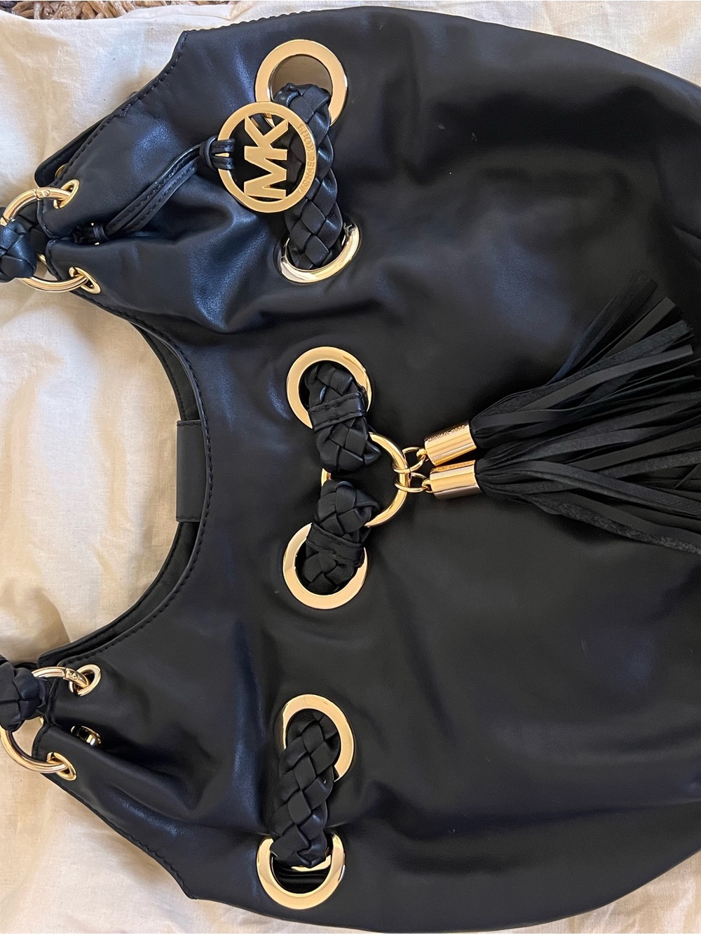 Michael Kors Black Leather Shoulder Bag with Gold Accents and Tassel
